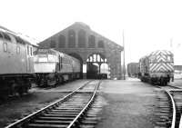 A grey day on Ayr shed. View north on 19 June 1970, with the main Ayr - Glasgow line off to the left. The shed yard is dominated by class 27 and 08 locomotives, with 5374 nearest the camera.<br><br>[John Furnevel 19/06/1970]