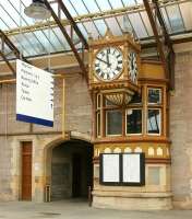 The feeling of 'times past' that seems to radiate from various corners of Perth station.... such as the magnificent old clock outside the former signal box midway along platform 5, seen here in 2006.<br><br>[John Furnevel 15/07/2006]