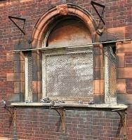 Pigeon perch in Partick. South window of the old Partick Central station in August 2006.<br><br>[John Furnevel 27/08/2006]