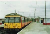 A refurbished 303 stops on a service to Balloch.<br><br>[Brian Forbes /10/1994]