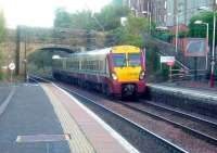 334009 at Johnstone station with a train bound for Largs<br><br>[Graham Morgan 09/10/2006]