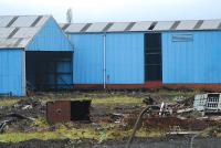 The shed at the Cowlairs Carriage Sidings viewed from the east with the remains of the train-washer in the foreground.<br><br>[Ewan Crawford 28/10/2006]