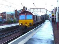66242 with coal empties for Hunterston passing through Johnston station.<br><br>[Graham Morgan 09/01/2007]