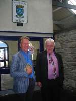 End of the line for Michael Portillo during the recording of <I>Great British Railway Journeys</I>, seen here at Wick with John Yellowlees in September 2012. [Editors note: The broad smiles are due to the pair having just discovered that they buy their shirts from the same website. (RailShirt.com)]<br><br>[John Yellowlees Collection /09/2012]