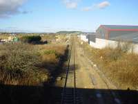 Looking north on Inverness line with Raiths farm on the left<br><br>[John G. Williamson 17/02/2007]
