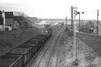 Class 40 with a northbound coal train passing the site of Cove station on 07 December 1974.<br><br>[John McIntyre 07/12/1974]