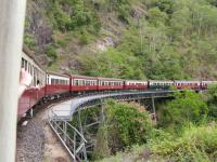 Crossing Stoney Creek Falls on the Kuranda Scenic Railway. This 3ft 6in railway runs inland from Cairns to Kuranda; the 41km journey taking 90 minutes. Makes the West Highland look like a TGV route...<br><br>[Paul D Kerr 19/01/2007]