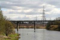 Looking east along the Clyde at Carmyle towards Westburn Viaduct in April 2007. The viaduct closed in May 1983 following the end of the freights between Carmyle Junction and Westburn Junction serving British Steel, Cambuslang.<br><br>[John Furnevel 08/04/2007]