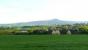 Fife Animal Park and Bistro, Collessie. The peak is East Lomond. A turbostar heads for Ladybank.<br><br>[Brian Forbes 26/04/2007]