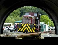 Exhibits at the Scottish Bus Group depot at Lathalmond. Ex Texaco 0-4-0DM is seen through the saddle tank of ex Barony Colliery no 17. June 2007. <br><br>[Bill Roberton /06/2007]