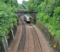 An Edinburgh Waverley - Glasgow Queen Street shuttle service in the cutting approaching the site of Philpstoun station on 7 July 2007.<br><br>[John Furnevel 07/07/2007]