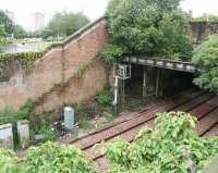 Site of the former Sinclairtown station on 22 July 2007 showing the remains of the booking office base and the line of the old stairway. Note also the blocked up doorway (top right) that once provided access from St Clair Street. View south towards Kirkcaldy town centre.  <br><br>[John Furnevel 22/07/2007]