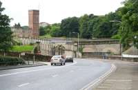 The surviving bridge abutments, embankment and arches are all part of the branch that once served Kirkcaldy Harbour (off picture to the left). View south along the A921 towards the Town Centre on 22 July 2007, with the former Nairns Linoleum factory in the background.<br><br>[John Furnevel 22/07/2007]