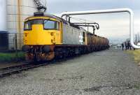 <I>Go on son, you drive it out. We cant be bothered</i>. 26 with molasses tanks at the United Molasses Depot, James Watt Dock.//16472,16476,16474,16475,16455,16477<br><br>[Ewan Crawford //1988]