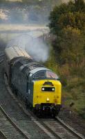 Deltic 55022 brings an SRPS Dundee - Oban excursion around the curve at Inverkeithing Central Junction on a chilly 6 October morning.<br><br>[Bill Roberton 6/10/2007]