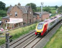 A southbound Voyager passing the former Gretna station in August 2007.<br><br>[John Furnevel 03/08/2007]