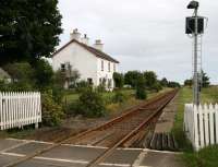 Standing on the open level crossing at the former Watten station in August 2007 looking towards Wick.<br><br>[John Furnevel 28/08/2007]