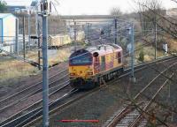 67001 turns south at Portobello Junction on 14 December and heads for Millerhill yard. The road bridge/embankment in the background follows the route that once carried the Lothian Lines spanning the <I>sub</I> and the ECML, on their way to Leith docks.  <br><br>[John Furnevel 14/12/2007]