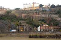 View across the Avon from the Portishead branch on 15 February towards the lower entrance to the Clifton Rocks Railway, a funicular built within the cliff face of the Avon Gorge. Closed since 1934, the Clifton Rocks Railway Trust has been formed with the objective of restoring this unique structure.<br><br>[Peter Todd 15/02/2008]