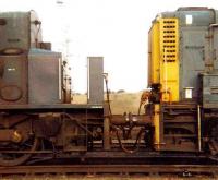 Detail of one of the 3 class 13 super - shunters formed by permanently coupling a pair of class 08s (one with the cab removed) in a <I>master and slave</I> combination to handle hump shunting in Tinsley Yard. (A larger rigid-framed locomotive could not be used due to a risk of grounding on the hump). This example consisted of D4189 (left) and D4190, jointly becoming D4501, later renumbered 13001. The locomotives became redundant on closure of Tinsley hump in 1985, with 13001 scrapped at BREL Swindon the same year. [See image 38598]<br><br>[Colin Alexander 15/02/1981]