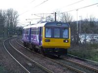 Northern pacer 142014, photographed approaching Johnstone on 27 February, on its way to Glasgow Works for overhaul. The 142 units use the G&SW route as they are banned from using part of the West Coast Main Line<br><br>[Graham Morgan 27/02/2008]