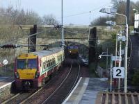 66098 and 334032 passing at Johnstone on 5th March<br><br>[Graham Morgan 05/03/2008]