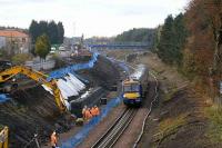 A Bathgate - Edinburgh service passes widening works near the former Bangour Junction in November 2007.<br><br>[James Young 15/11/2007]