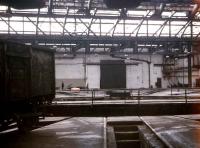 A solitary wagon sits on a turtable road in a roundhouse at York in June 1969. This was one of the buildings subsequently converted to form part of the NRM.<br><br>[John McIntyre 08/06/1969]