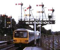 A DMU passes under the signal gantry leaving Radyr station in 1993.<br><br>[Ian Dinmore //1993]