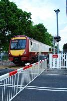 Westbound at Cambus level crossing on the first day of public service.<br><br>[Ewan Crawford 19/05/2008]