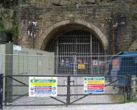 The west portal of the 1954 Woodhead tunnel on 24 May 2008. This 3 mile double track tunnel was built for the Manchester-Sheffield-Wath electrification and replaced the 2 original single track mid 19th century tunnels alongside. Passenger services over Woodhead ceased in 1970 with the last train using the tunnel in 1981.<br><br>[John McIntyre 24/05/2008]