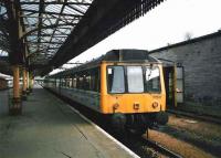 The 1727 from Edinburgh via Dunfermline, formed by 117 301, stands at platform 7 at Perth in May 1998.<br><br>[David Panton /05/1998]