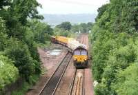 EWS 66184 brings a Sunday morning PW train off the Bathgate branch and onto the main line at Newbridge Junction on its way back to Millerhill Yard during branch engineering work on 29 June 2008.<br><br>[John Furnevel 29/06/2008]