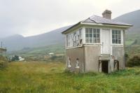 Abandoned signal box at Kells, County Kerry, in 1981. The 1893 station at Kells, on the Great Southern and Western Railway Valencia Harbour branch, closed in 1960. This 40 mile branch off the Tralee - Mallow main line reached the most westerly location in Europe to be served by rail. [Valencia Island was also the point at which the first transatlantic telegraph cable came ashore in 1858].<br><br>[Bill Roberton //1981]