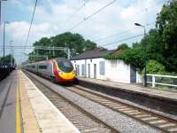 Penkridge has not got many features but this Pendolino rattles the shutters on the disused station building as it heads for Wolverhampton. See 18690 for a view by Ewan of the outside of this structure. <br><br>[Mark Bartlett 27/07/2008]