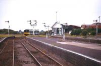 Platforms to spare... one of the large early 20th century seaside excursion stations, Skegness, Lincolnshire, seen here in 1995 with a Nottingham train passing the signal box.<br><br>[Ian Dinmore //1995]