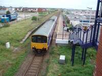 Squires Gate, serving Blackpool Airport and the nearby Starr Gate tram terminus, opened in 1931. It was something of an eyesore for many years but has now been tidied up. View towards St. Annes as 150133 departs towards Blackpool South. <br><br>[Mark Bartlett 13/08/2008]