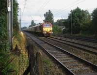 Travelling on the Up Slow line at Euxton on 6 September is 67027 with an <I>Orient Express - Northern Belle</I> charter.<br><br>[John McIntyre 06/09/2008]