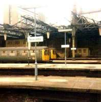 <I>Rationalisation work</I> underway at Newcastle Central on 8 March 1980, with BRC&W Class 104s E50565 & E50556 standing in the east end bay platforms waiting to depart on North Tyneside services. This area is now a car park.<br>
<br><br>[Colin Alexander 08/03/1980]