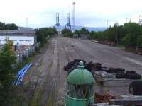 Looking over the site of Princes Pier Shed, it was latterly is use as container sidings for Greenock Ocean Terminal. To the left is Greenock Central Sawmills, where the shed buildings stood. The sidings have been out of use for some years. <br><br>[Graham Morgan 20/09/2008]