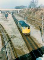 A class 27 runs past the south end of Kingmoor Yard in the early 1980s.<br><br>[Colin Alexander //]