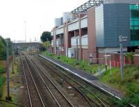 As well as the real Old Trafford ground [See image 21085] there is this <I>bit of a football club</I> nearby with its own station. The halt is electrified and used on match days by services that would normally terminate at Deansgate being extended. At the far end of the platform the line through the halt is also connected to the lines into the Trafford Park container base that lies just beyond the far bridge. <br><br>[Mark Bartlett 17/10/2008]