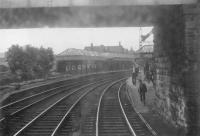 Crieff station on 4 July 1964, the last day of passenger services.  A view through a rather grimy window of the guards van as the train leaves for Gleneagles.<br><br>[John Robin 04/07/1964]
