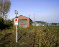The original 1958 C&W shop at Perth New Yard in October 2008, with 1990's style Depot Protection signals. The more modern 1992(?) C&W shed stands in the distance.<br><br>[Gary Straiton /10/2008]