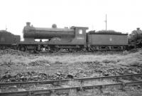Reid ex-NBR <I>Scott</I> class 4-4-0 no 62442 <I>Simon Glover</I> stands at Thornton in July 1958. Officially withdrawn by BR that year, the locomotive was cut up in February of 1960 at Motherwell Machinery & Scrap, Wishaw.<br>
<br><br>[Robin Barbour Collection (Courtesy Bruce McCartney) 29/07/1958]