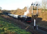 BR 9F 92203 <I>Black Prince</I> running into Winchcombe from Cheltenham on 7 December with Greet tunnel in the background.<br>
<br><br>[Peter Todd 07/12/2008]