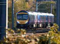 First TransPennine 185117 heads away from the camera as it takes the Chorley line from the Up Fast WCML at Euxton Junction with a service to Manchester Airport on 1 November 2008.<br><br>[John McIntyre 01/11/2008]