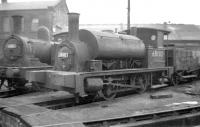 BR class Y9 0-4-0 ST no 68102, complete with wooden tender and dumb buffers, stands at St Margarets shed in January 1958. Introduced as the Holmes G class by the NBR in 1882 the last example was withdrawn by BR in 1962. Another long term resident of St Margarets, W Worsdell J72 0-6-0T no 69014, stands alongside.<br><br>[Robin Barbour Collection (Courtesy Bruce McCartney) 03/01/1958]