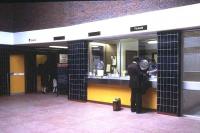 State-of-the-art (at that time) new entrance hall and ticket office at Walsall station in July 1980 - complete with new British Rail blackboard.<br><br>[Ian Dinmore /07/1980]