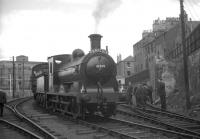 J36 no 65234 stands at North Leith with a branch line railtour in 1964. The figure on the right is District Operating Inspector David G Kerr, a well known face on many such specials.<br><br>[K A Gray 29/08/1964]